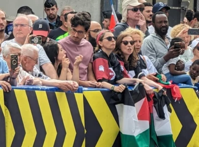 protesters express solidarity with palestine during paris olympic cycling event